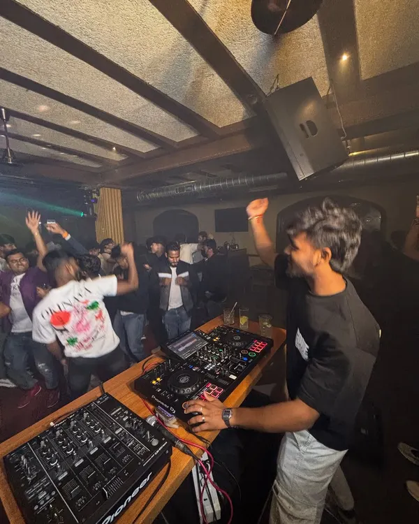 From dusk till dawn, the party never stops. Here I am, hyping up the crowd at a packed club in Bangalore.