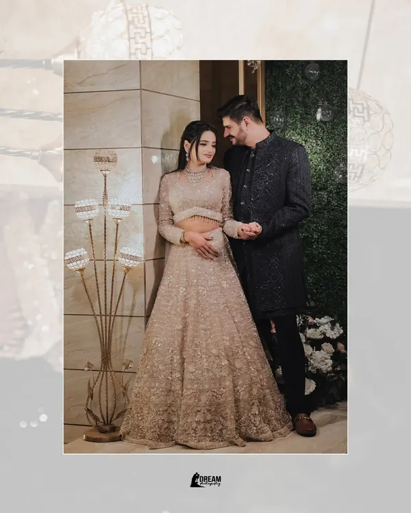 A classic portrait of Rishul and Vanshika at their sagan ceremony, sharing a sweet glance.