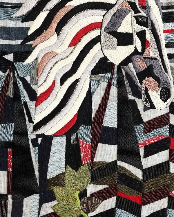 This is a close look at the soul of my work, where every single thread is placed with intention. This hand-embroidered tapestry, part of my Protagonist Series, showcases the incredible texture and detail that makes each piece a unique work of art, blending traditional techniques with a contemporary vision.