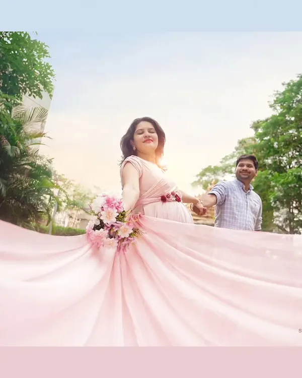 A fairytale moment for this beautiful couple. We love using flowing gowns and natural light to create these magical, romantic outdoor maternity portraits that feel like they are straight out of a movie.