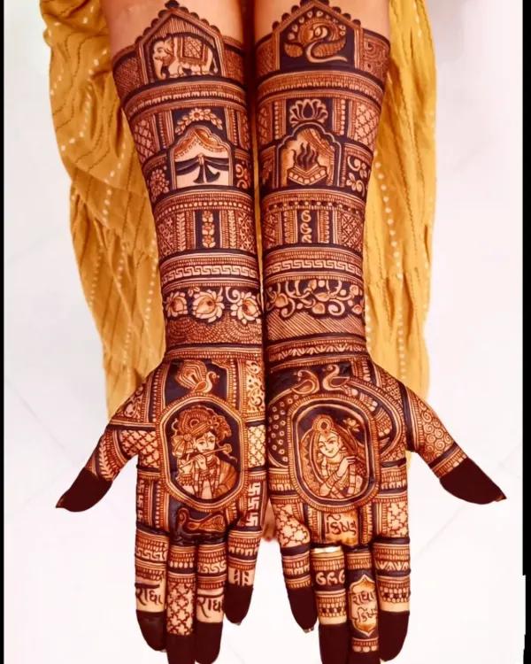 This is the kind of detailed art I love to create. This full bridal design features beautiful portraits of Radha and Krishna on the palms, surrounded by traditional Rajasthani jharokha architecture and elephant motifs, telling a story of divine love.