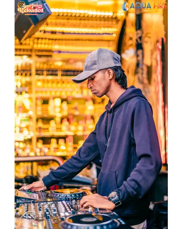 Focused and in the zone. This is me at my console, reading the crowd and planning the next track.