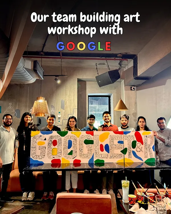 Here's the proud team from Google with their finished collaborative doodle art. It was amazing to see them fill the canvas with inside jokes, team memories, and colorful designs, creating a piece that is uniquely theirs.