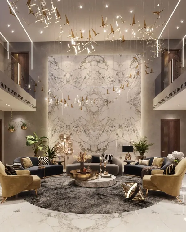This double-height living room is the heart of the home, designed to be a masterpiece of modern luxury. The symmetrical book-matched marble wall and cascading bird chandelier create a breathtaking focal point, embodying my philosophy of redefining luxury through grand, artistic statements.