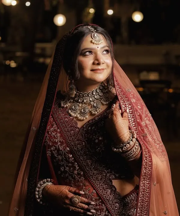 This is my signature bridal style. I created a look that is both radiant and timeless, focusing on luminous skin, softly defined eyes, and a classic lip color. The makeup is designed to look flawless in person and in professional wedding photography, ensuring you look perfect from every angle.