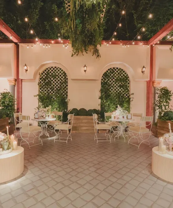 For a cocktail soirée, we transformed the venue into a Parisian courtyard. With soft lighting, classic architecture, and cozy seating, the space felt intimate, romantic, and effortlessly chic.