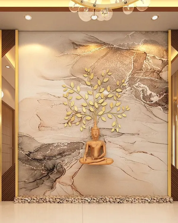 This foyer is designed to be a tranquil and awe-inspiring entrance. A golden Buddha statue sits before a Bodhi tree sculpture, set against a dramatic marble-effect wall with wood and brass accents.