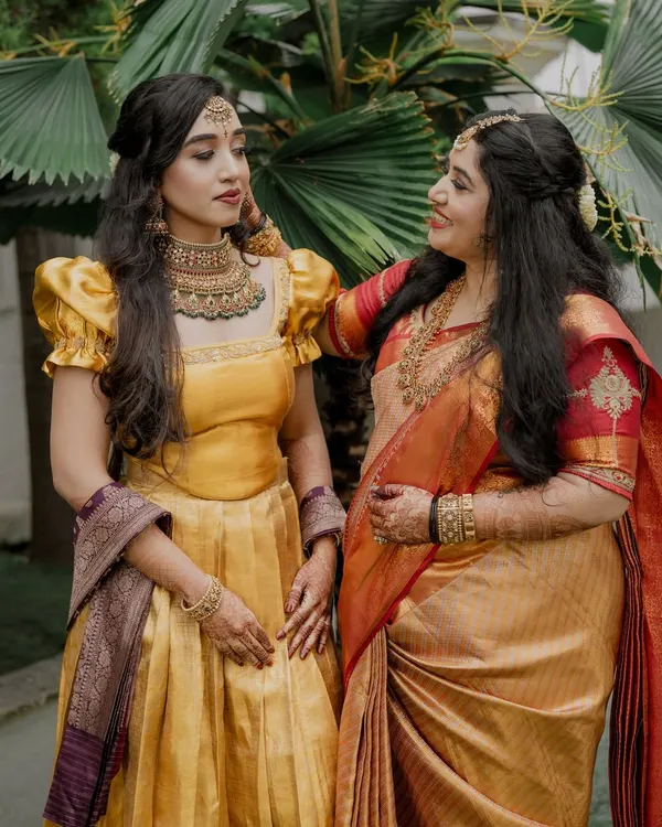 It's always a pleasure to do makeup for the bride and her family. Here, the bride and her mother share a special moment, both looking radiant for the wedding festivities.