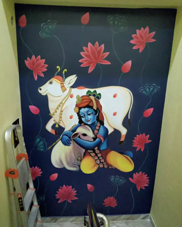This Pichwai-style Krishna wall mural is very close to my heart. I painted it for a client's home temple, aiming to create a divine and peaceful atmosphere with the depiction of Krishna, his cow, and the surrounding lotus flowers. 🙏