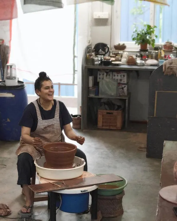 A quiet moment of focus at the wheel. Our studio offers a welcoming environment where you can find your own corner and immerse yourself in your work, surrounded by fellow creators.