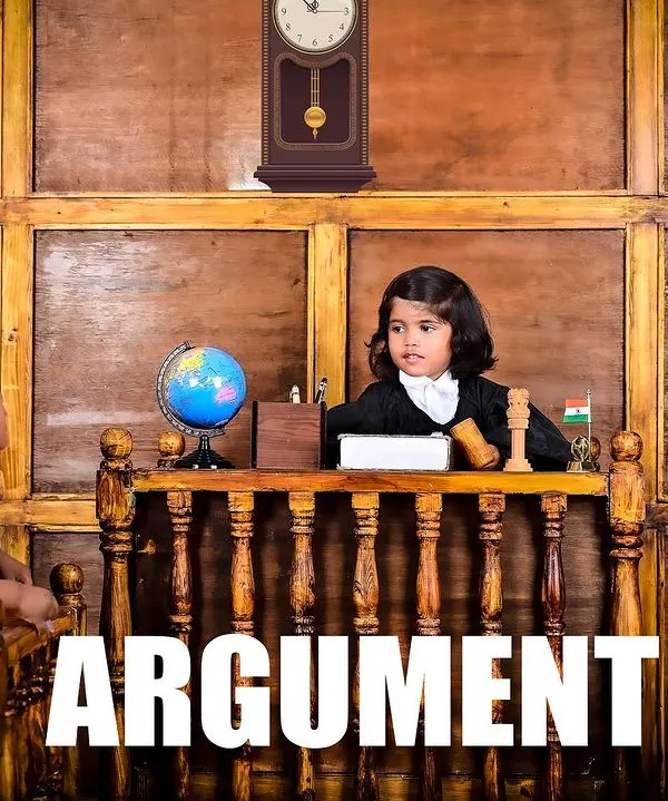 The arguments have begun! This playful courtroom-themed photo captures the fun and drama of childhood imagination, turning a creative idea into a hilarious and memorable portrait.