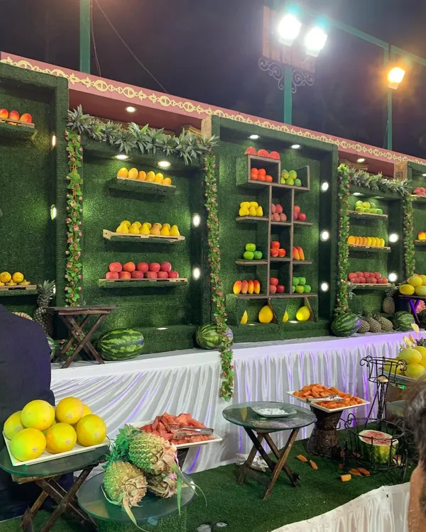 I take pride in creating food displays that are both delicious and visually stunning. This fresh fruit wall is one of my signature offerings, providing a healthy, colorful, and refreshing option that always becomes a talking point for guests at any wedding or event.