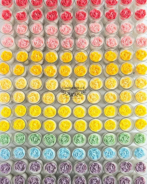 I believe every celebration deserves a splash of color. This rainbow of handmade peony flower candles, all crafted from 100% natural soy wax, shows the vibrant possibilities we can create together for your special day. Each one is a unique piece of art for your guests.