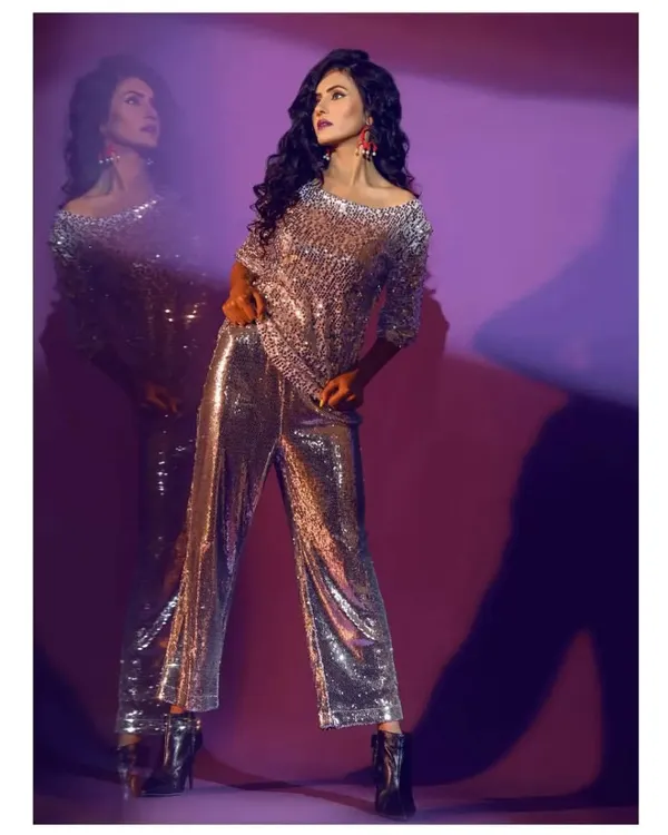 This is what I live for. Creating a full-on glam rock mood for an editorial shoot. I styled this look with a silver sequin co-ord set, pairing a relaxed fit top with shimmering trousers and black ankle boots to create a powerful silhouette.