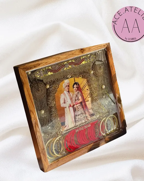 Your bridal story doesn't end with the wedding. I preserved this bride's precious kaleeras, chuda, and wedding photo in a deep teakwood frame, creating a stunning piece of wall art filled with memories.