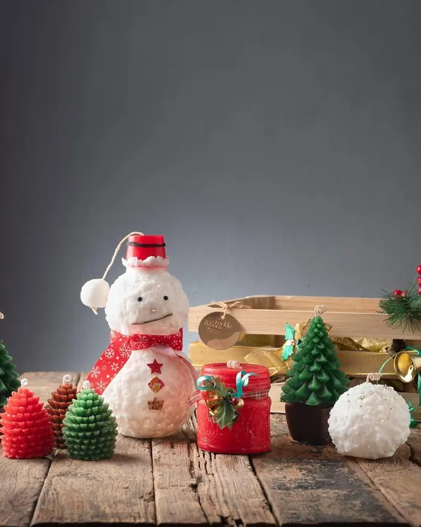 A glimpse of my Christmas collection, featuring a variety of handmade candles like the snowman, Christmas trees, pinecones, and festive jar candles. Each piece is designed to bring holiday cheer.