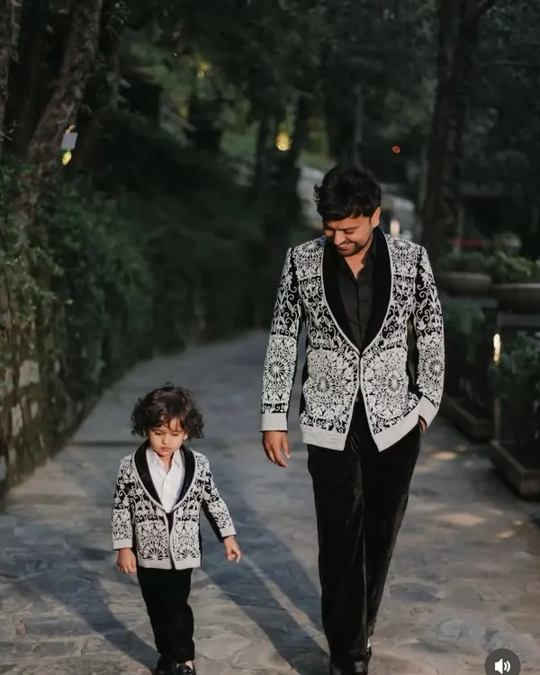 A timeless moment captured with a father and son in our coordinated, hand-embroidered Indowestern jackets. We design not just outfits, but memories that are passed down through generations.