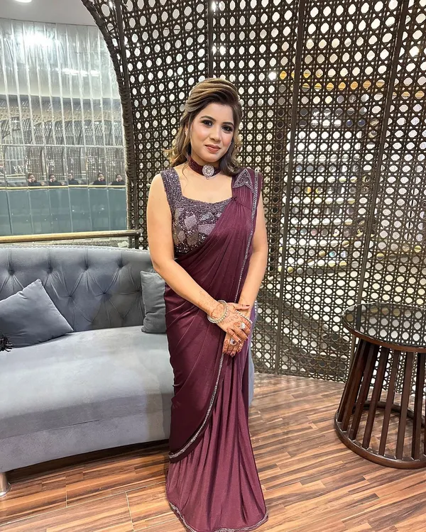 A beautiful client ready for a party in an elegant saree. I gave her a sophisticated look with a soft updo and makeup that highlights her eyes.