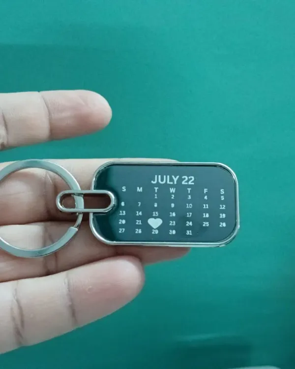 Keep a special date close with this personalized calendar keychain. I can engrave any month and highlight a specific day with a heart.