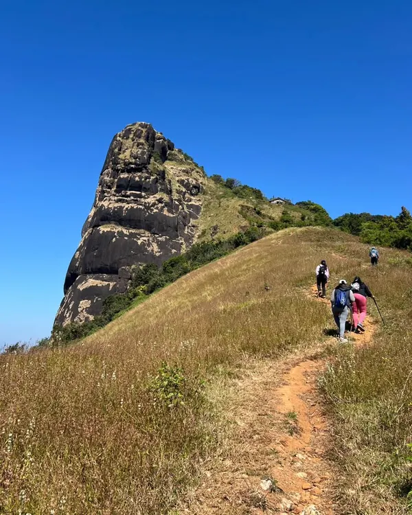 The unique and rocky Kurinjal peak, as seen from the trekking trail. It's a rewarding climb with fantastic views.