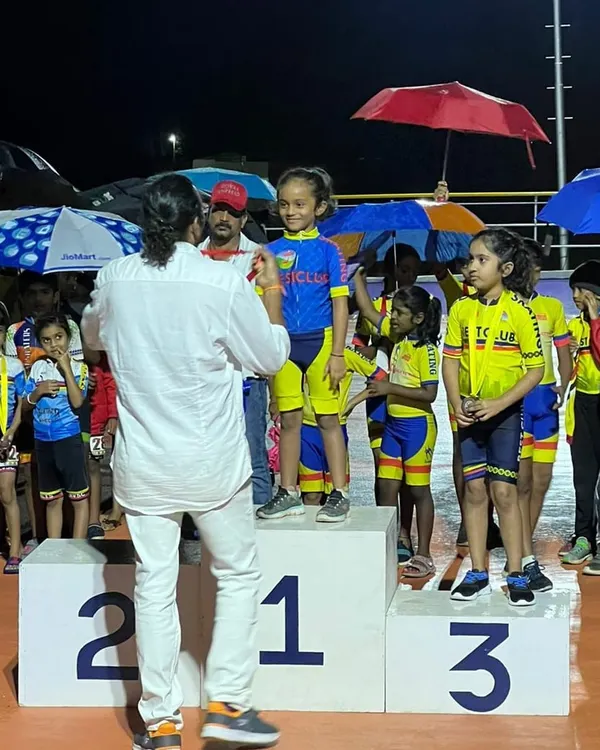 A new beginning for my daughter. Presenting her with a gold medal at her first district championship is a memory I will always cherish.