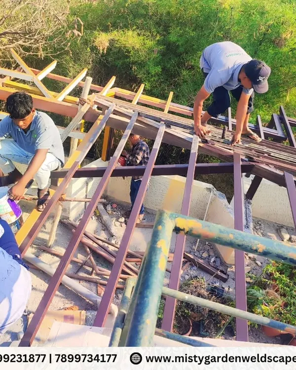 My team at work, painting and finishing the metal frame of a pergola. Every step, from fabrication to finishing, is done with care and precision.