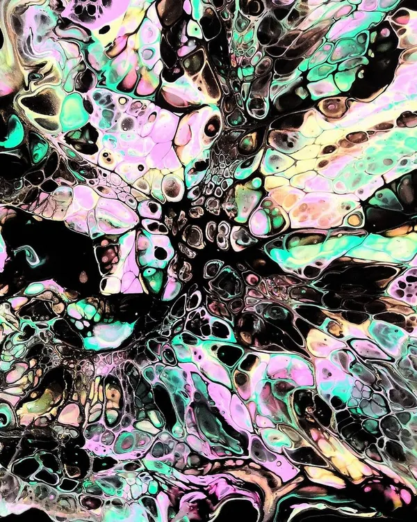 A close-up of the incredible 'cell' patterns that can be achieved with acrylic pouring. This effect is created by a reaction between the paints and a silicone additive.