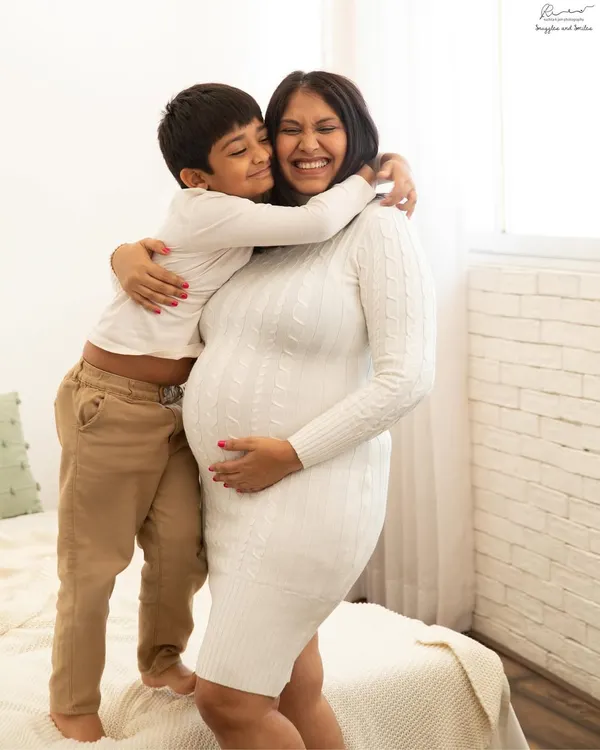 The biggest, warmest hug for mom and the baby bump. Capturing the love of a soon-to-be big brother is one of the sweetest parts of my job.