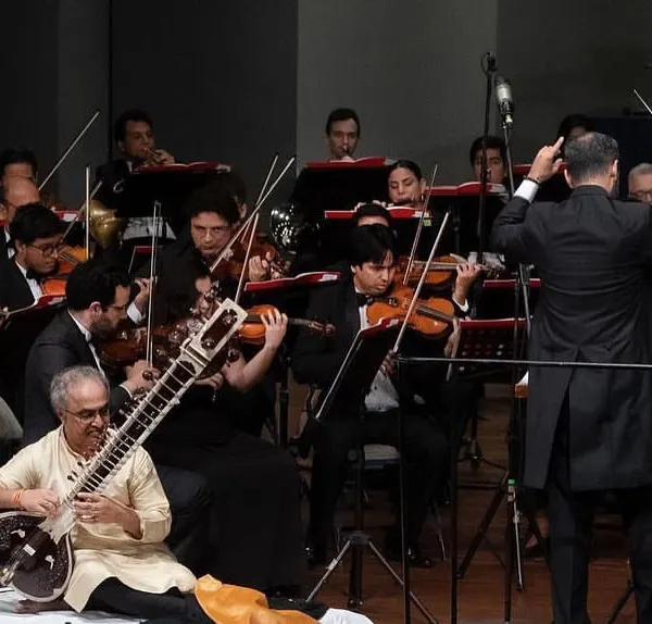 Performing my Guru Pandit Ravi Shankar's Sitar Concerto No. 1 with the Guayaquil Municipal Orchestra in Ecuador. It is an honor to bring the sound of the sitar to a full philharmonic orchestra, bridging worlds through music.