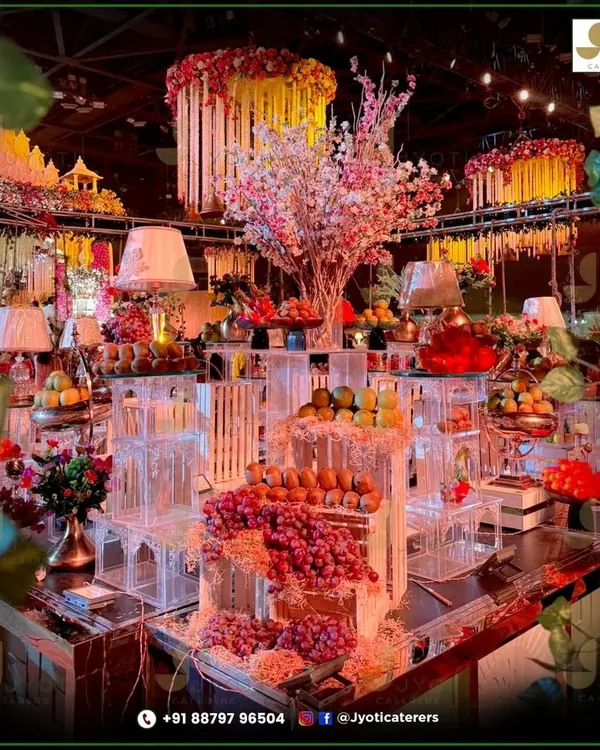 I believe in creating a feast for the senses. This elaborate fruit display, with its vibrant colours and artistic arrangement, serves as a stunning, edible centerpiece for a grand wedding celebration.