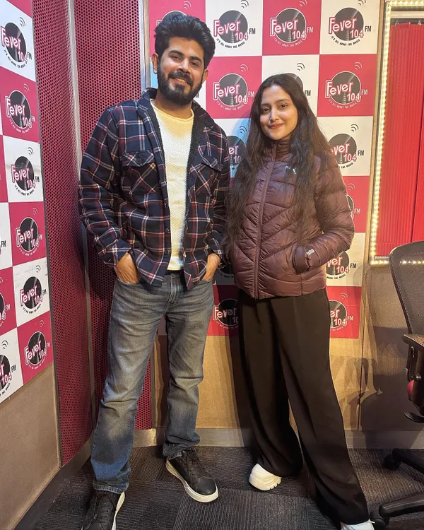At the Fever FM 104 studio with my husband and bandmate, Nandan. We were there to talk about our original song "Noor E Jabeen" and our musical journey together.