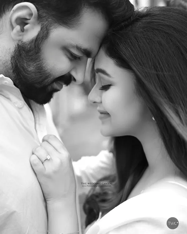 An intimate black and white portrait that focuses on the quiet connection between a couple. By removing color, we emphasize the emotion, tenderness, and the simple act of being together.
