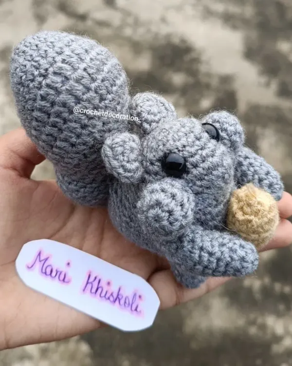 A closer look at the detailed stitch work on our popular 'Mari Khiskoli' crochet squirrel. We focus on creating a firm, high-quality finish so our toys can withstand plenty of hugs.