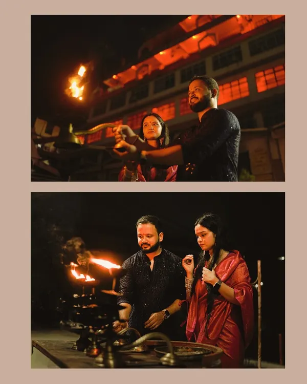 A truly divine moment captured during the Ganga Aarti in Rishikesh. The fire, the faith, and their shared reverence create a powerful and unforgettable image.