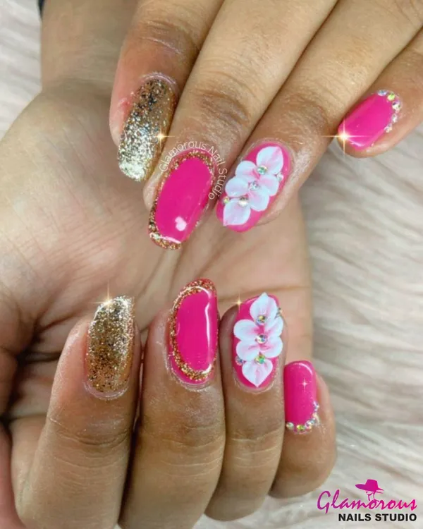 This set is all about high-impact glamour. We used a vibrant fuchsia base with full-coverage gold glitter accent nails, 3D white flowers, and a delicate gold glitter border for a truly luxurious finish.