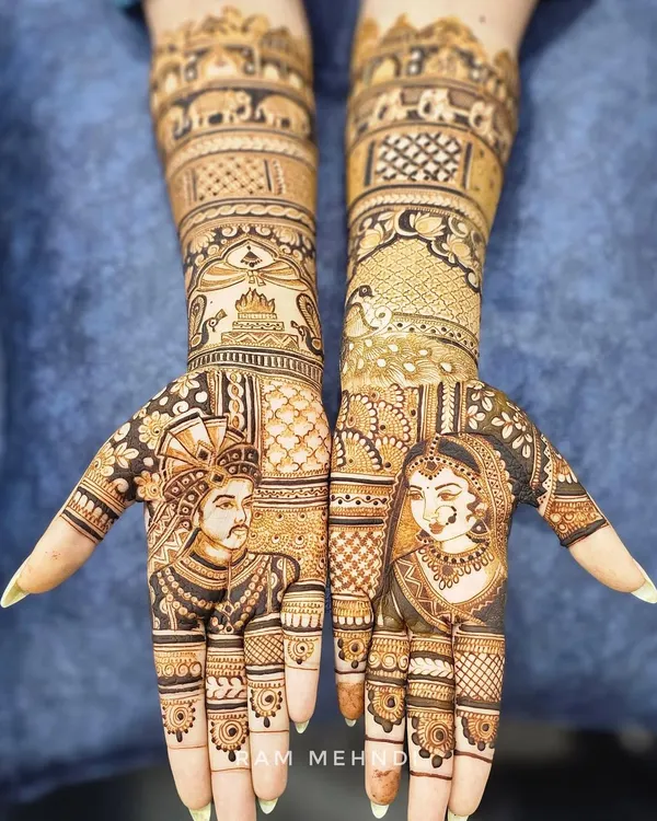A complete bridal design featuring detailed portraits of the bride and groom on each palm. The arms are decorated with traditional elephant motifs and architectural elements, telling a full story.