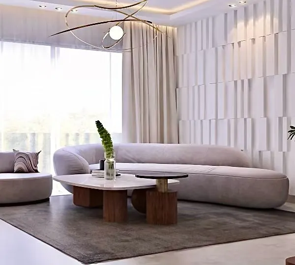 This living room, designed for a project in Ace Parkway, Noida, embodies our love for the Japandi style. The custom-made curved sofa creates a soft, inviting focal point, while the textured wall paneling and minimalist marble coffee table bring together aesthetics and tranquility.