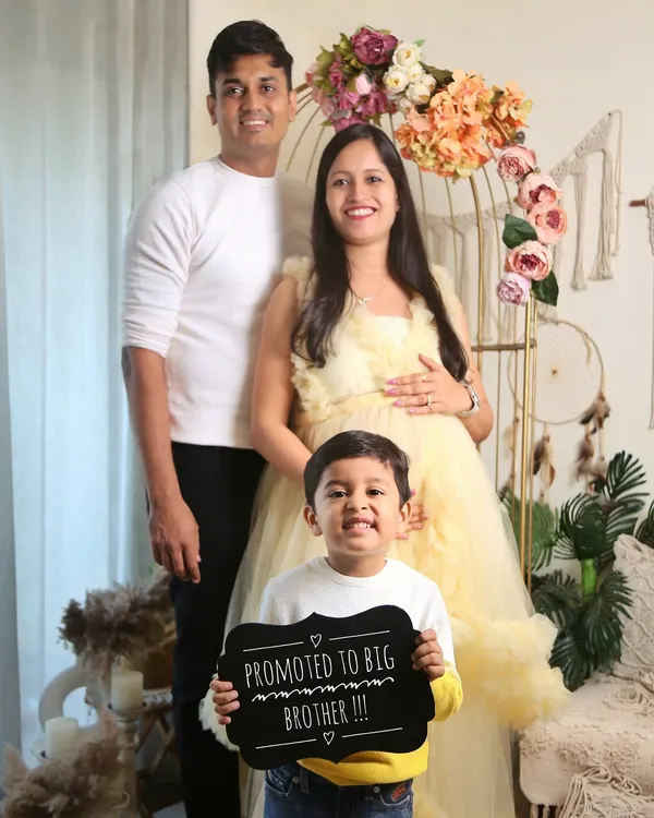 This little guy is so excited to be a big brother. Using props like this chalkboard sign makes for a super cute and personal pregnancy announcement that includes the older sibling.