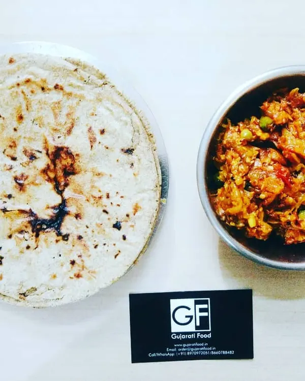 The classic Kathiyawadi combination of Ringan no Oro, a smoky roasted eggplant dish, served with a traditional Bajri Rotlo (millet flour flatbread). This is a wholesome and delicious meal.