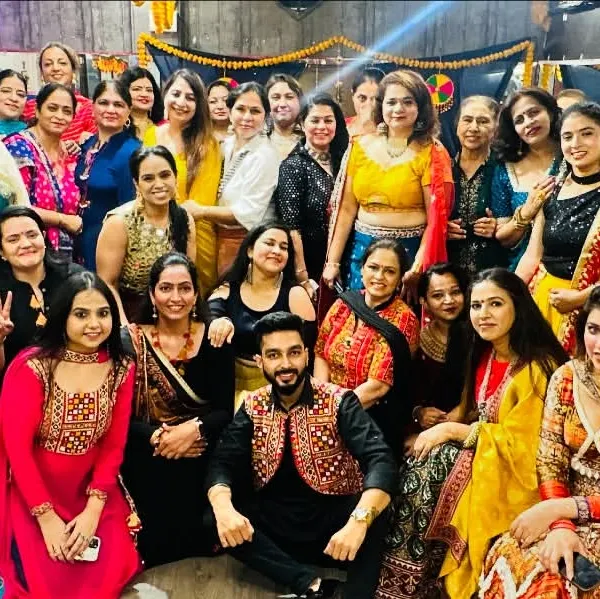 A group photo capturing the vibrant energy of our Dandiya Night. Look at all the beautiful smiles and traditional outfits. This is our fit fam celebrating Navratri together.
