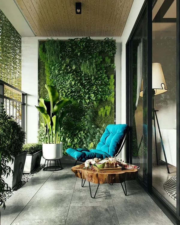 A perfect example of a balcony transformed by a lush vertical garden. This living wall provides a stunning green feature, enhancing the ambiance and making the small space feel like a private jungle retreat.