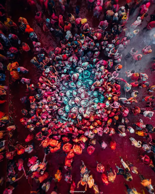 This is what divine chaos looks like from above. Using my drone, I captured the explosion of colors during the Holi festival in Nandgaon, Mathura. It's not just a festival; it's a vibrant, spiritual experience of togetherness, and this aerial perspective shows the sheer scale and energy of the celebration.