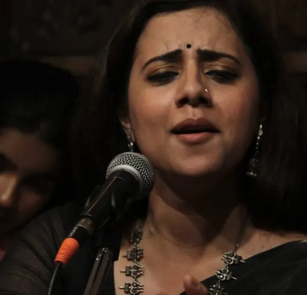 The essence of a performance lies in its emotional depth, or 'bhaav'. Here, Smt. Tanushree Kashyap Sharma is completely immersed in her vocal recital, a moment of pure surrender to the raga during one of our baithaks.