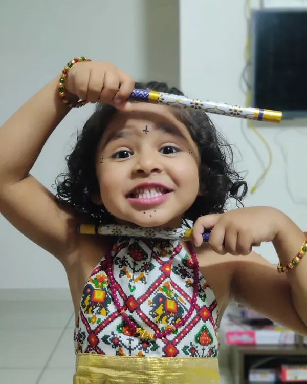Our little princess is all smiles and ready for her Garba night in this adorable printed chanya choli.