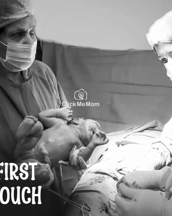 The first touch. This powerful black and white image from a hospital session captures the incredible moment a mother meets her baby for the very first time.
