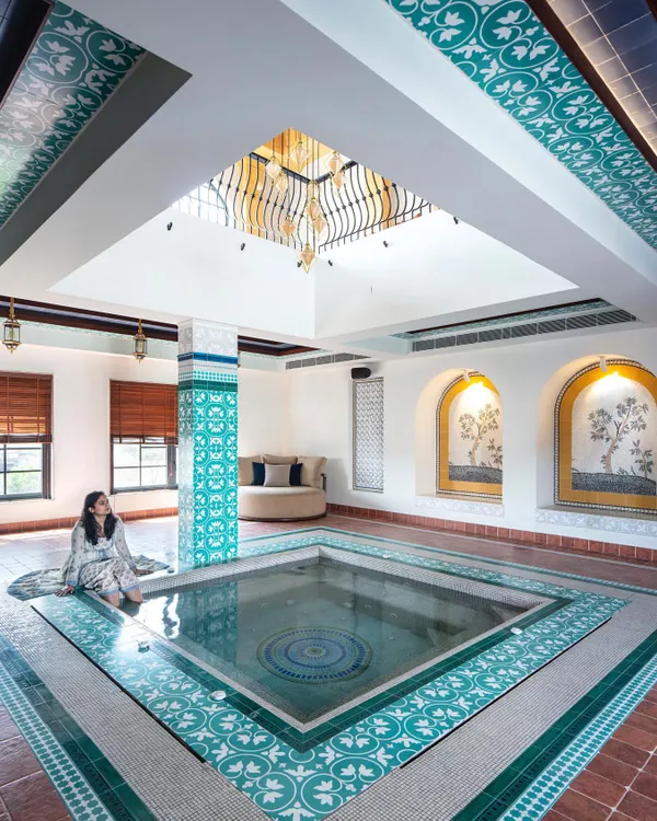 The indoor swimming pool at our Wanderlust Villa project is a true sanctuary. Inspired by Moroccan design, it features custom turquoise mosaic tiles, arched niches, and a dramatic skylight, creating a space for ultimate relaxation.