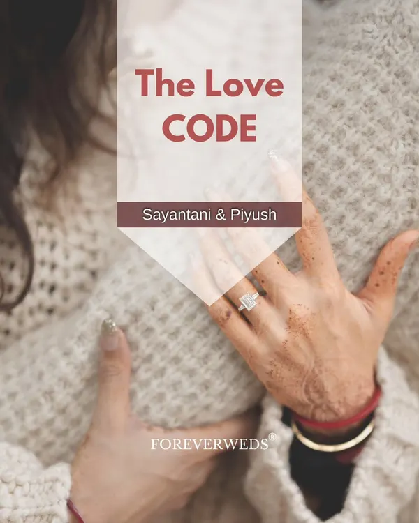 Every couple has their own love code. This pre-wedding album cover for Sayantani and Piyush was designed to capture the intimacy and promise of their journey together, focusing on the detail of the engagement ring.