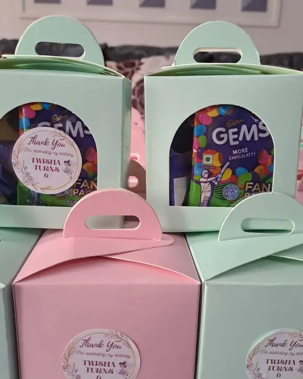 These mini choco boxes are a wonderful and affordable return gift idea. I created these for Twisha's 6th birthday party for her to share with friends, complete with personalized 'Thank You' stickers.