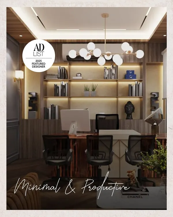 This home office design is minimal and productive. It features extensive built-in shelving with integrated lighting, a sleek desk, and ergonomic chairs, creating a workspace that is both stylish and highly functional.