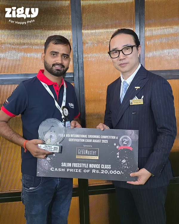 We are incredibly proud of our groomer, Sanjay Kumar, seen here receiving his award at the PPGAI 6th International Grooming Competition. His success in the Salon Freestyle Novice Class reflects our team's dedication to excellence.